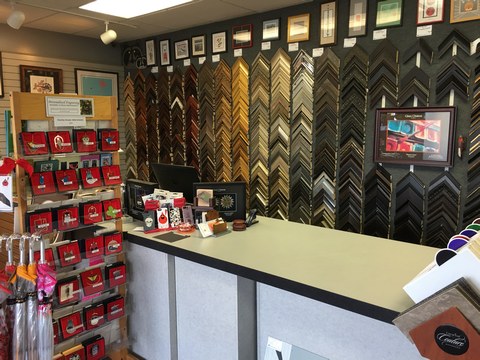 view of moulding and mat samples, and adornments featuring the art of Charley Harper at the Tri-County store
